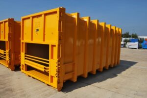 Caisson de compaction et barres de brochages