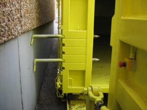 Caisson de compaction et barres de brochages